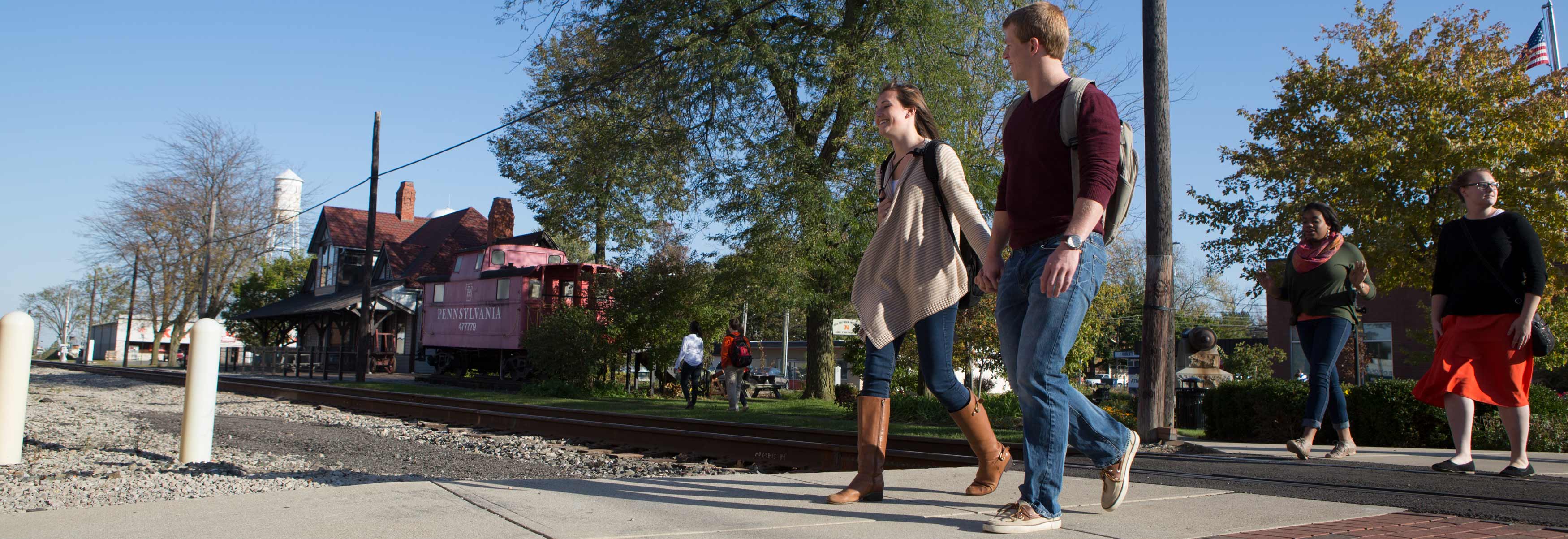 Ohio Northern University students walk through downtown Ada.