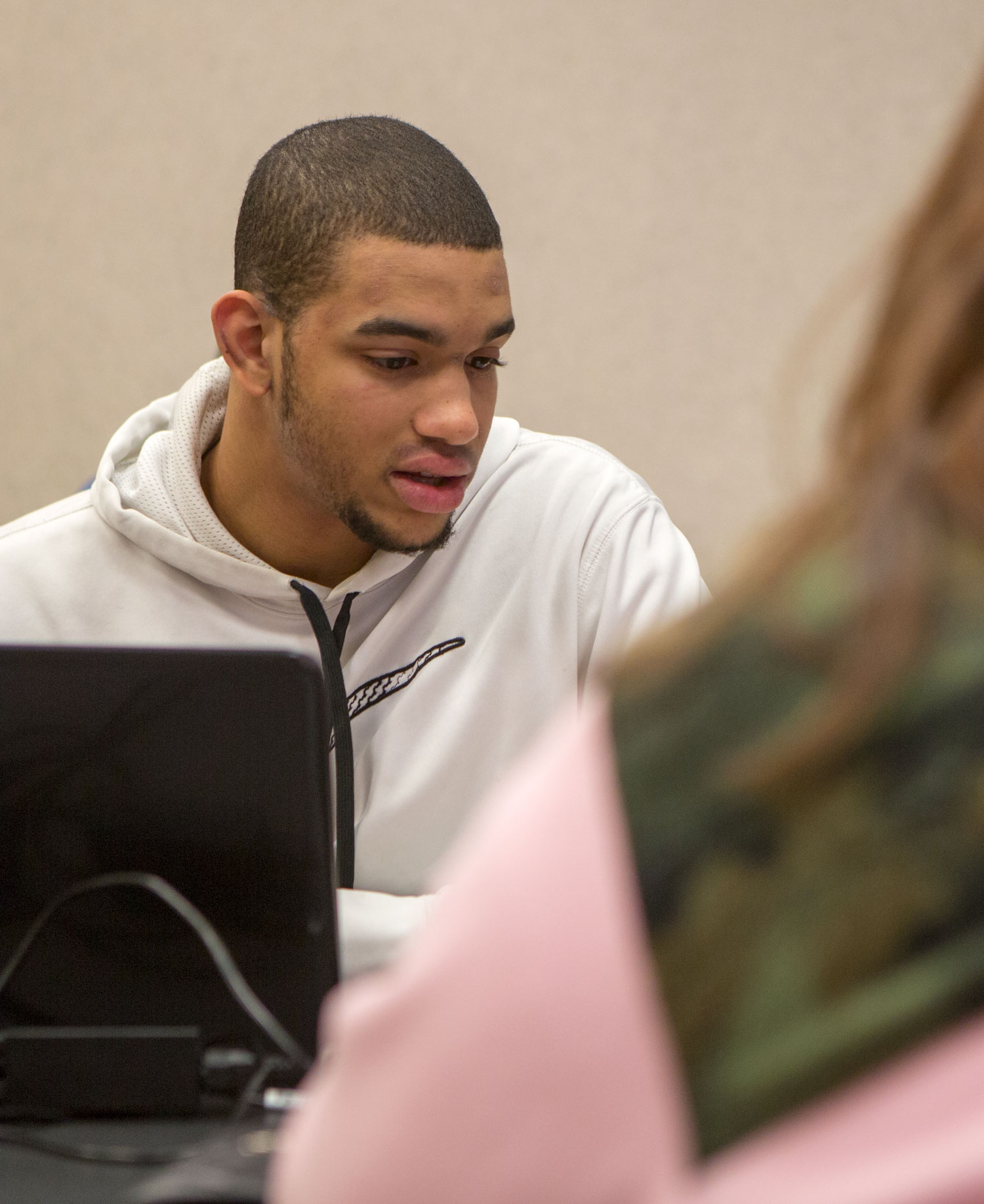 student helps complete the taxes of visitors to the Ohio Northern University Dicke College of Business Administration. 